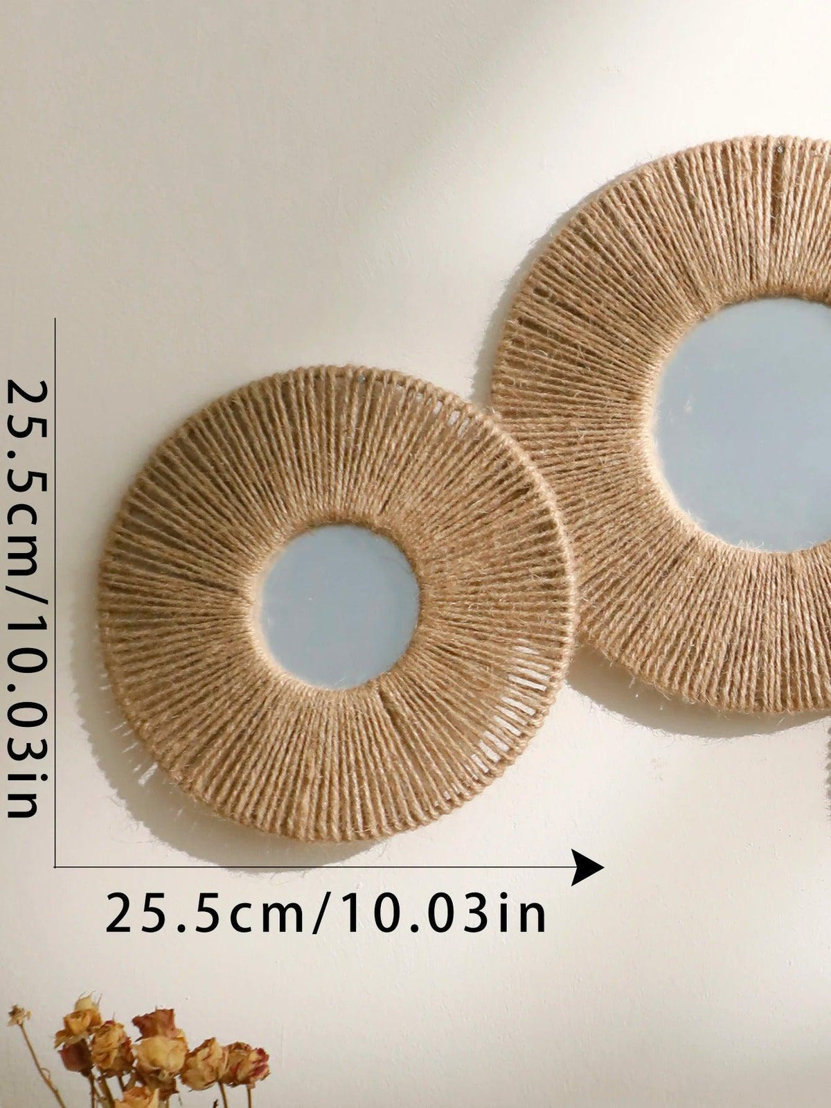 Interieur Nest | Ronde decoratieve wandspiegel in boho stijl met geweven henneptouw